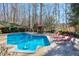 Refreshing pool with plenty of lounge space at 531 Sweetfern Ln, Sugar Hill, GA 30518