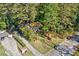 House nestled in a wooded neighborhood at 610 Glenforest Rd, Sandy Springs, GA 30328