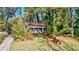 Ranch home nestled among tall trees at 610 Glenforest Rd, Sandy Springs, GA 30328