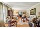 Spacious living room featuring hardwood floors and vintage furniture at 610 Glenforest Rd, Sandy Springs, GA 30328