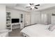 Main bedroom with built-in shelving, desk, and en-suite bathroom at 4197 Spring Valley Cir, Tucker, GA 30084