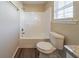 Bright bathroom with tub and shower, toilet, and vinyl flooring at 444 Kara Ln, Mcdonough, GA 30253