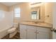 Clean bathroom with granite countertop, white cabinets, and a shower/tub combo at 444 Kara Ln, Mcdonough, GA 30253