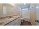 Updated bathroom with granite vanity, tub, and vinyl flooring at 444 Kara Ln, Mcdonough, GA 30253