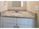 Bathroom vanity with granite countertop and white cabinets at 444 Kara Ln, Mcdonough, GA 30253