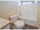 Full bathroom with tub, toilet, and granite countertop at 444 Kara Ln, Mcdonough, GA 30253