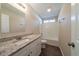 Full bathroom with granite vanity, tub, and vinyl flooring at 444 Kara Ln, Mcdonough, GA 30253