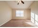 Spacious bedroom with ceiling fan and neutral decor at 444 Kara Ln, Mcdonough, GA 30253