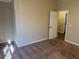 Spacious carpeted bedroom with an ensuite bathroom at 444 Kara Ln, Mcdonough, GA 30253