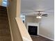 Gas fireplace and brown carpeting in the living room area at 444 Kara Ln, Mcdonough, GA 30253