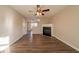 Living room with fireplace and ceiling fan at 444 Kara Ln, Mcdonough, GA 30253