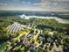 Aerial view of a lakefront community with luxury homes and marina at 6733 Holiday Pt, Buford, GA 30518