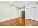 Unfinished basement with hardwood floors and ample storage at 6733 Holiday Pt, Buford, GA 30518