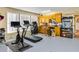 Basement home gym with exercise equipment and storage at 6733 Holiday Pt, Buford, GA 30518