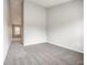 Spacious bedroom with grey carpet and neutral walls at 9020 Amberly Way, Cumming, GA 30028