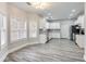 Spacious kitchen with stainless steel appliances and granite countertops at 9020 Amberly Way, Cumming, GA 30028