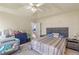 Large bedroom with a king-size bed and plenty of natural light at 121 Millwheel Dr, Villa Rica, GA 30180