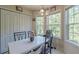 Bright dining area with bay window and white table at 121 Millwheel Dr, Villa Rica, GA 30180