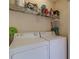 Convenient laundry room with washer and dryer at 121 Millwheel Dr, Villa Rica, GA 30180