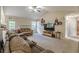 Living room with sectional sofa and tv at 121 Millwheel Dr, Villa Rica, GA 30180