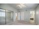 Spacious bedroom with mirrored closet doors and carpet at 1801 Parkaire Xing, Marietta, GA 30068