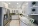 Modern kitchen with stainless steel appliances and granite counters at 1801 Parkaire Xing, Marietta, GA 30068