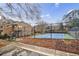 Community tennis court with a chain link fence at 1801 Parkaire Xing, Marietta, GA 30068