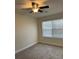 Bright bedroom with neutral walls, ceiling fan, and carpet flooring at 2770 Stony Place Ct, Grayson, GA 30017