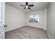 Spacious bedroom with neutral walls, carpeting, and ceiling fan at 2770 Stony Place Ct, Grayson, GA 30017