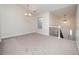 Open dining room with view of entryway and stairs at 2770 Stony Place Ct, Grayson, GA 30017