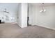 Bright dining room features a chandelier and carpet at 2770 Stony Place Ct, Grayson, GA 30017