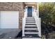 Steps leading to the front door with white railings at 2770 Stony Place Ct, Grayson, GA 30017