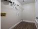 Laundry room with wire shelving and vinyl flooring at 2770 Stony Place Ct, Grayson, GA 30017