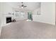 Bright living room with fireplace and access to backyard at 2770 Stony Place Ct, Grayson, GA 30017