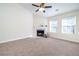 Living room with fireplace and large windows at 2770 Stony Place Ct, Grayson, GA 30017