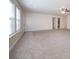 Spacious living area with carpeting and access to a bathroom at 2770 Stony Place Ct, Grayson, GA 30017