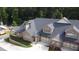 Stone and brick home with two-car garage; aerial view at 4821 Josie Way, Acworth, GA 30101