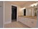 Elegant bathroom with double vanity and large mirror at 4821 Josie Way, Acworth, GA 30101