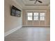 Bright bedroom featuring hardwood floors and a ceiling fan at 4821 Josie Way, Acworth, GA 30101