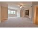 Spacious bonus room with carpet and ceiling fan at 4821 Josie Way, Acworth, GA 30101