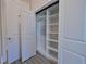 White closet with built-in shelves and a safe at 4821 Josie Way, Acworth, GA 30101