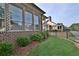 Landscaped yard with brick home exterior at 4821 Josie Way, Acworth, GA 30101