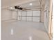 Spacious two-car garage, featuring epoxy flooring and overhead storage at 4821 Josie Way, Acworth, GA 30101