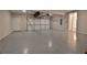 Two-car garage with epoxy flooring and overhead storage at 4821 Josie Way, Acworth, GA 30101