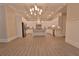 Modern white kitchen with island and hardwood floors at 4821 Josie Way, Acworth, GA 30101