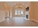 Living room with hardwood floors, fireplace, and access to entryway at 4821 Josie Way, Acworth, GA 30101