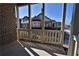 Cozy covered porch with view of neighboring homes at 4821 Josie Way, Acworth, GA 30101