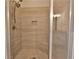 Large walk-in shower with tiled walls and built-in seat at 4821 Josie Way, Acworth, GA 30101