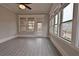 Sunroom featuring hardwood floors and multiple windows at 4821 Josie Way, Acworth, GA 30101