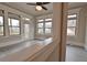 Bright sunroom with multiple windows and access to a balcony at 4821 Josie Way, Acworth, GA 30101